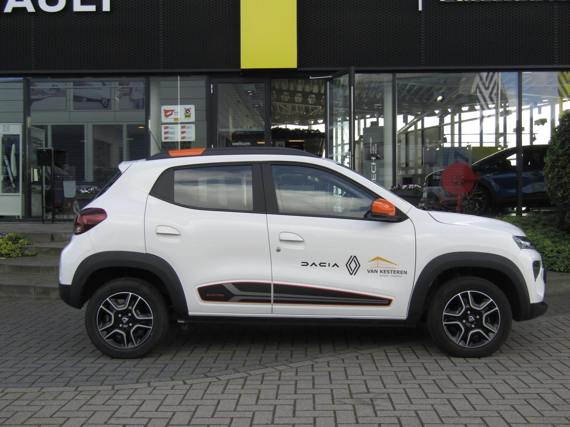 Dacia Spring Electric Comfort Plus Orange Pack / Navigatie / Camera / Leder / DC Lader